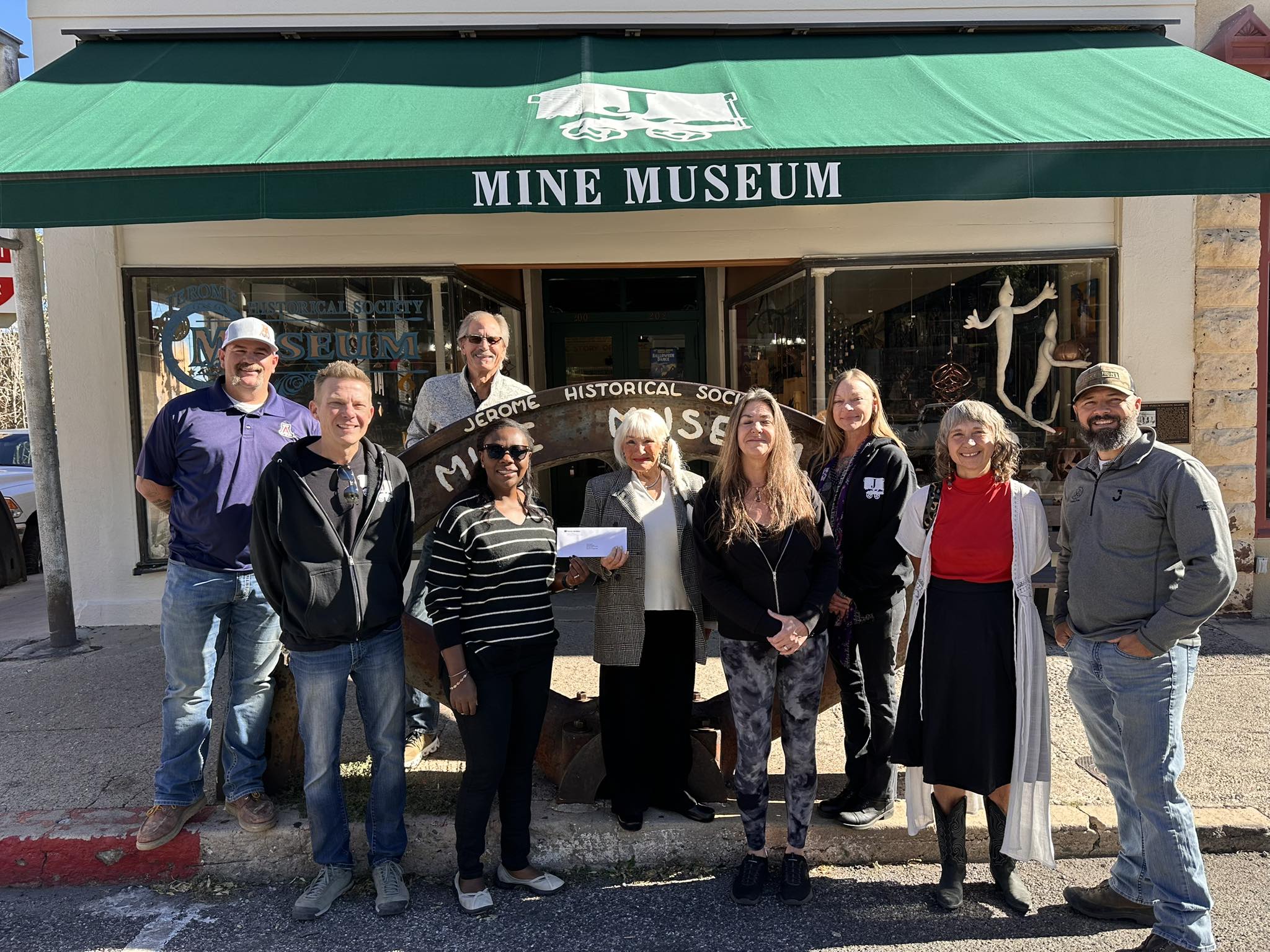 Group posing outside Jerome Mine Museum and Historical Society
