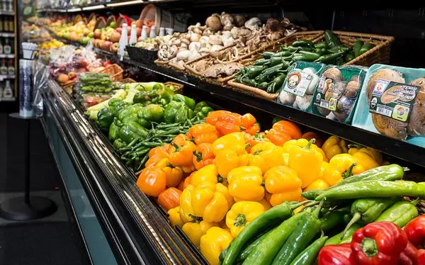 Assortment of fresh vegetables at market stall