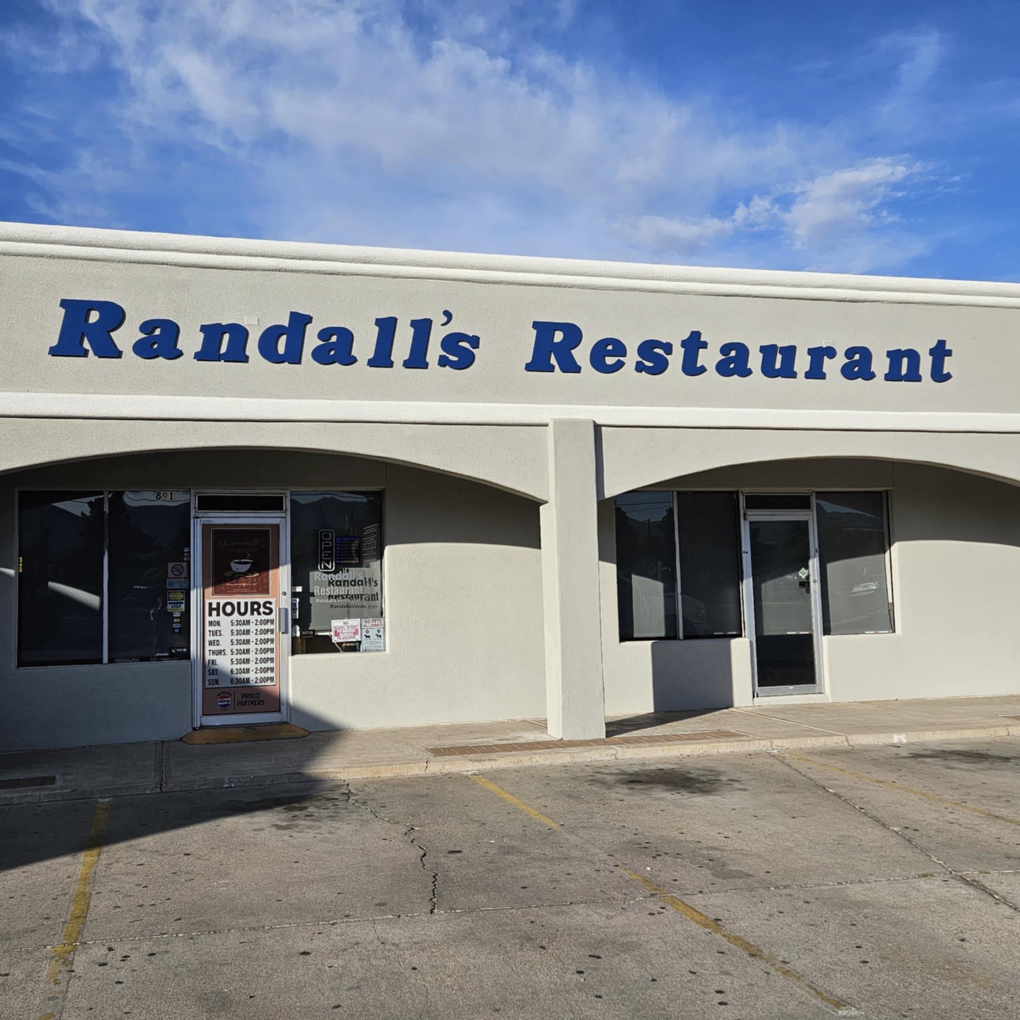 Randall’s Restaurant exterior with hours signage, open daily 5:30 AM to 2 PM.