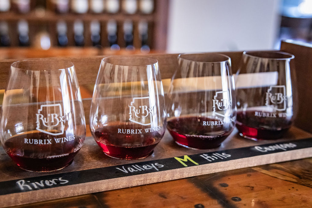 Four Rubrix Wines samples labeled Rivers, Valleys, M Hills, Canyon on display