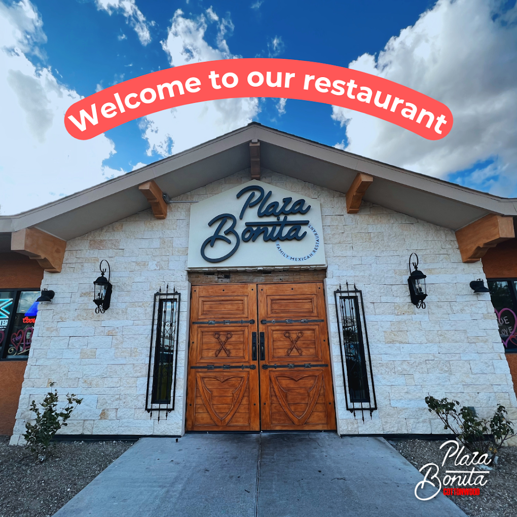 Plaza Bonita Mexican Restaurant entrance with wooden doors and welcoming sign