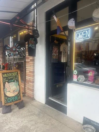 Open boutique storefront with Wildeski Gifts sign outside